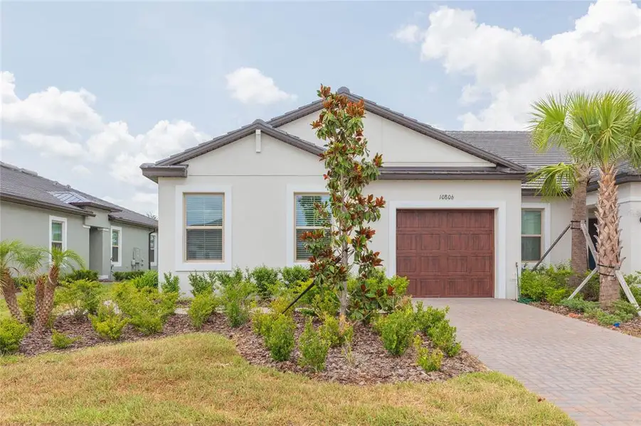 Front exterior of a new home in , San Antonio, FL, highlighting curb appeal (Image 23). Front exterior of a new home in , San Antonio, FL, highlighting curb appeal (Image 23).