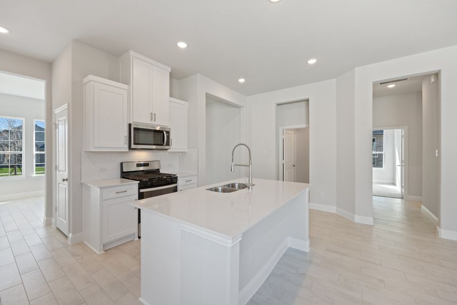 Representative furnished interior of a home built from the Waverly III by Megatel Homes in Bellagio, Forney (Image 4).