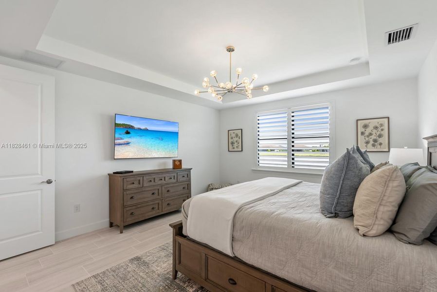 Furnished interior view inside a new home in Del Webb Naples, Ave Maria (Image 12).