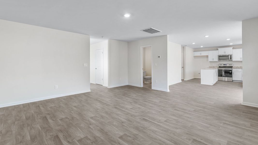 Spacious, unfurnished interior of a new home in English Farm, Archdale (Image 16).