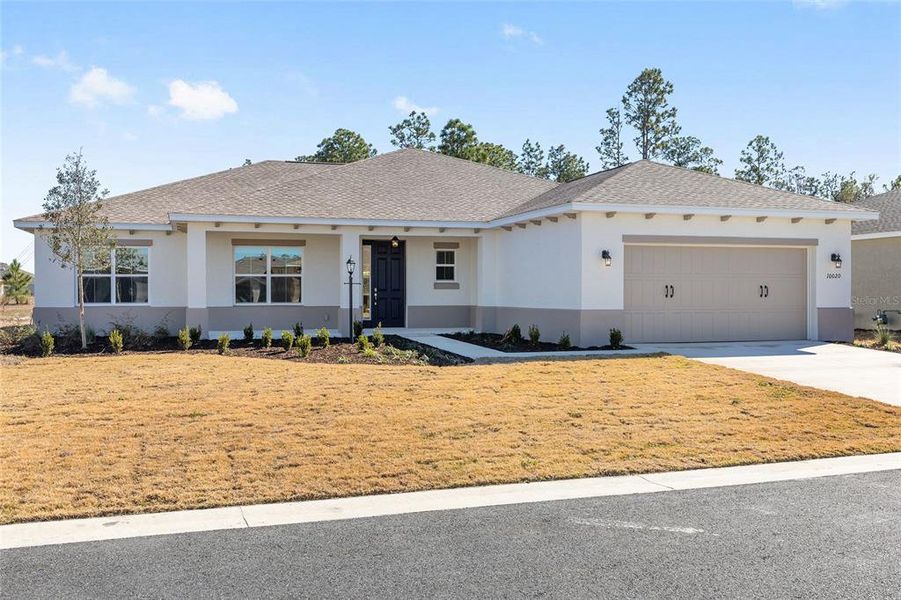 Front exterior of a new home in , Ocala, FL, highlighting curb appeal (Image 18).