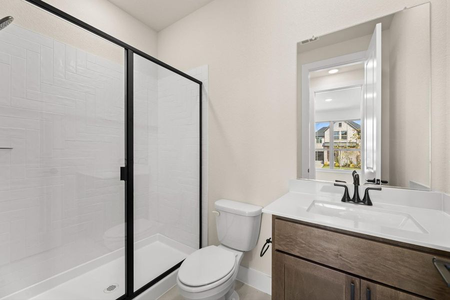 Furnished interior view inside a new home in Garden Collection at Union Park, Little Elm (Image 11).