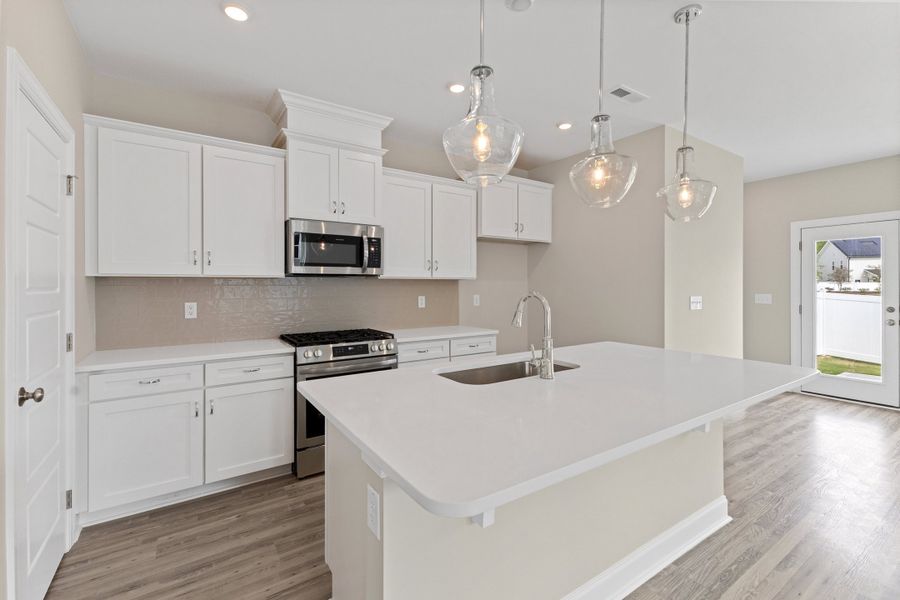 Representative furnished interior of a home built from the The Juniper by RobuckHomes in Kennebec Crossing, Angier (Image 21).