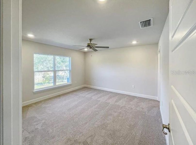 Spacious, unfurnished interior of a new home in Poinciana - Polk County, Poinciana (Image 4).