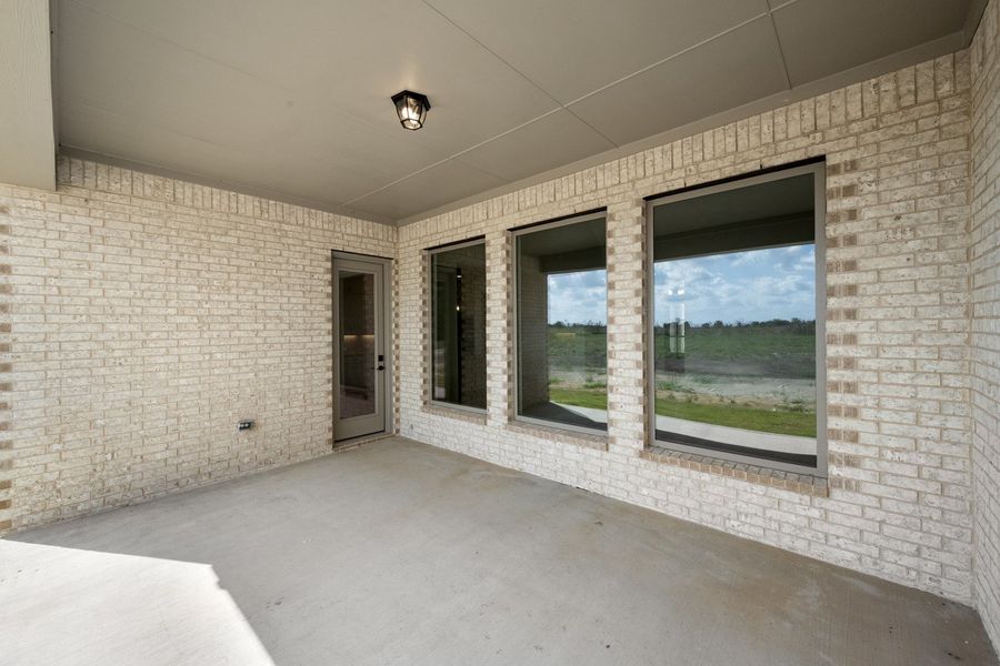 Exterior details and patio area of a home in Levante - 1 Acre Lots, Waxahachie (Image 3).