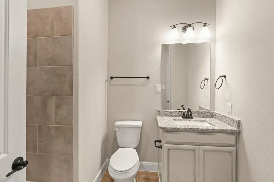 The secondary bathroom is stylishly appointed and thoughtfully designed for comfort and convenience. The secondary bathroom is stylishly appointed and thoughtfully designed for comfort and convenience.