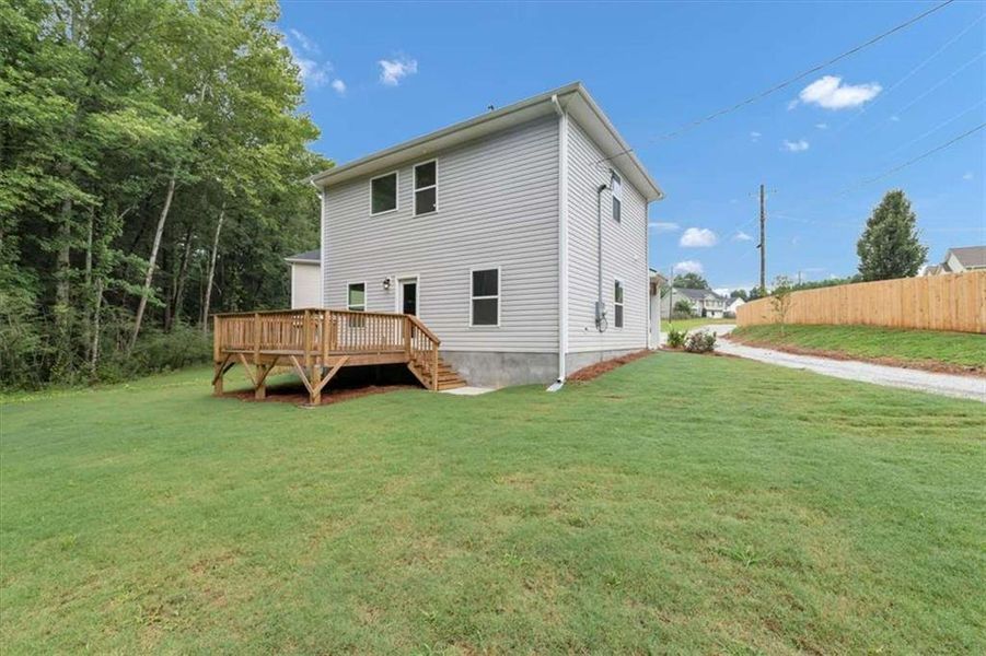 Exterior details and patio area of a home in Scarlett Place, Bowdon (Image 22).