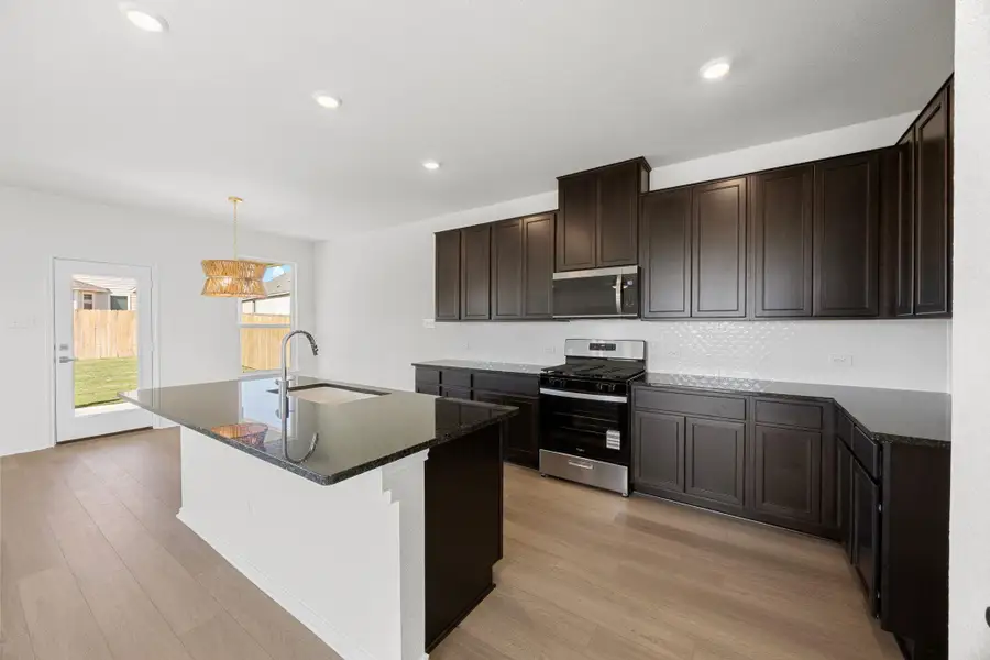 Furnished interior view inside a new home in Salerno - Heritage Collection, Round Rock (Image 6). Furnished interior view inside a new home in Salerno - Heritage Collection, Round Rock (Image 6).