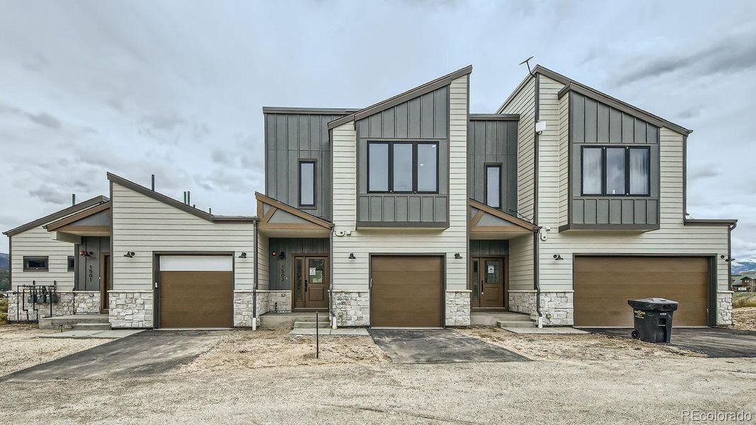 Front exterior of a new home in , Tabernash, CO, highlighting curb appeal (Image 17).