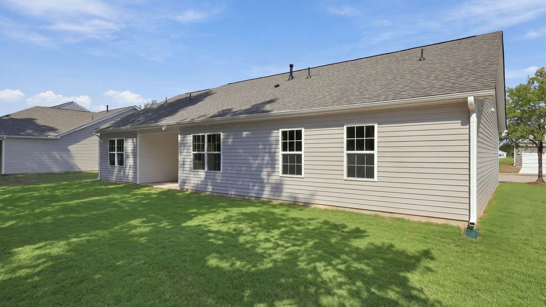 Exterior details and patio area of a home in Tyler - Home on the Lake, New Bern (Image 20).