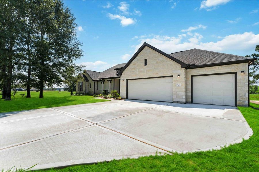 Front exterior of a new home in Barton Place, Cleveland, TX, highlighting curb appeal (Image 1). Front exterior of a new home in Barton Place, Cleveland, TX, highlighting curb appeal (Image 1).