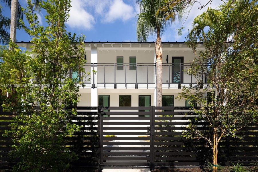 Front exterior of a new home in , Miami, FL, highlighting curb appeal (Image 21).