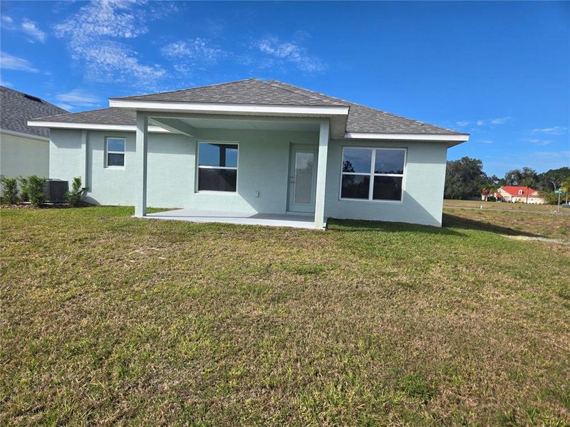 Exterior details and patio area of a home in Wyld Palms, Inverness (Image 18).