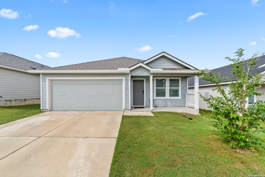 Front exterior of a new home in Ridgeland, Kerrville, TX, highlighting curb appeal (Image 2). Front exterior of a new home in Ridgeland, Kerrville, TX, highlighting curb appeal (Image 2).