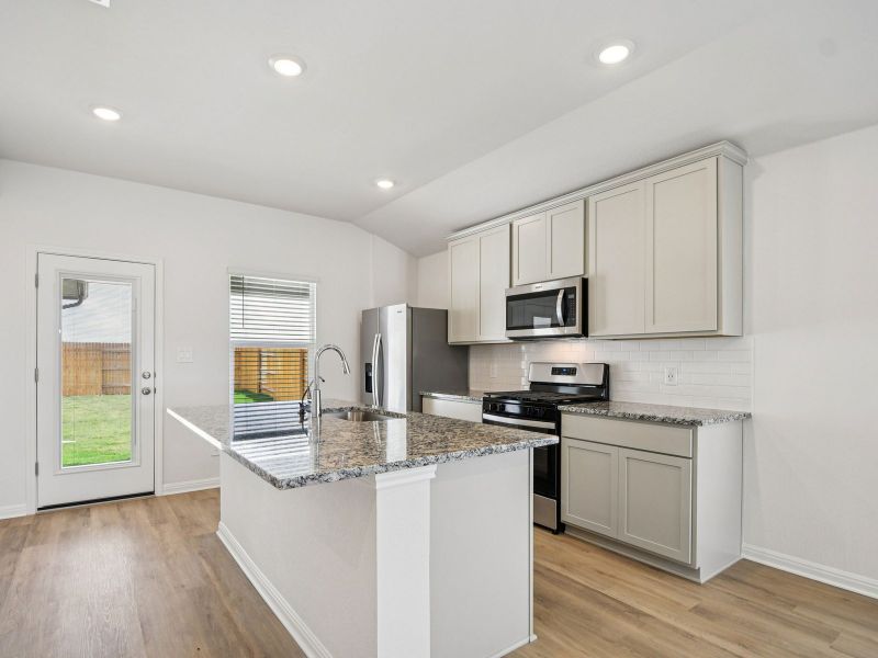Furnished interior view inside a new home in Prairie Winds - Reserve Collection, Hutto (Image 3).
