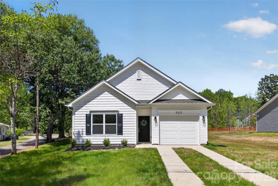 Front exterior of a new home in , Charlotte, NC, highlighting curb appeal (Image 1). Front exterior of a new home in , Charlotte, NC, highlighting curb appeal (Image 1).