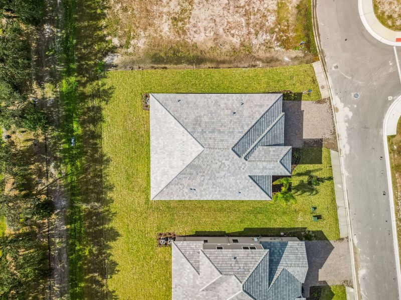 Exterior details and patio area of a home in River Preserve Estates, Parrish (Image 38).
