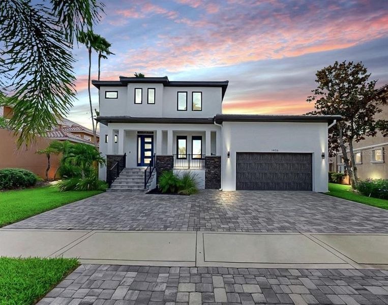 Front exterior of a new home in , Apollo Beach, FL, highlighting curb appeal (Image 22).