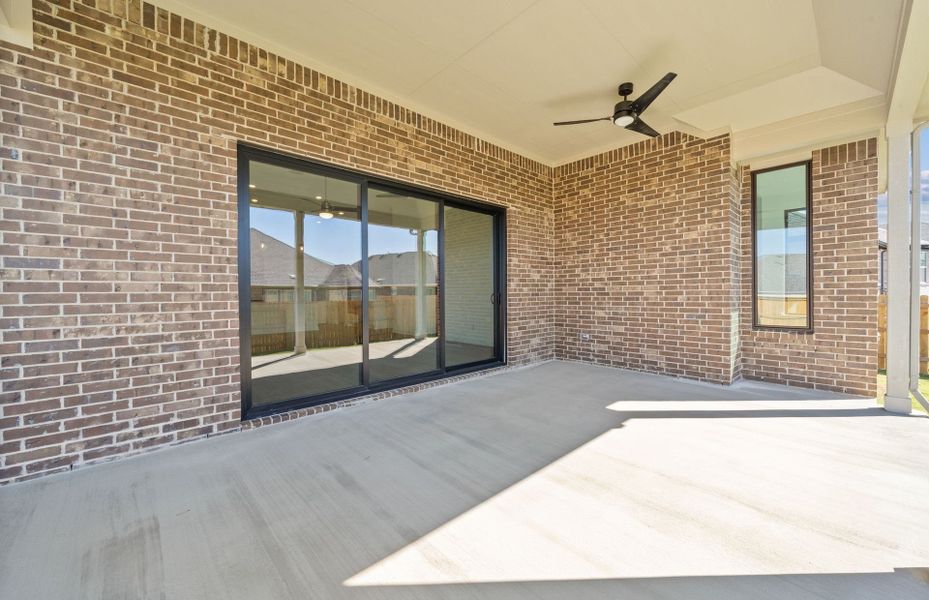 Exterior details and patio area of a home in 6 Creeks, Kyle (Image 22).