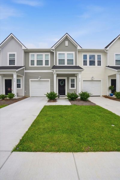 Front exterior of a new home in , Summerville, SC, highlighting curb appeal (Image 1). Front exterior of a new home in , Summerville, SC, highlighting curb appeal (Image 1).