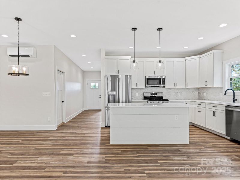 Kitchen View - Dining on Left - Entry Way in Background