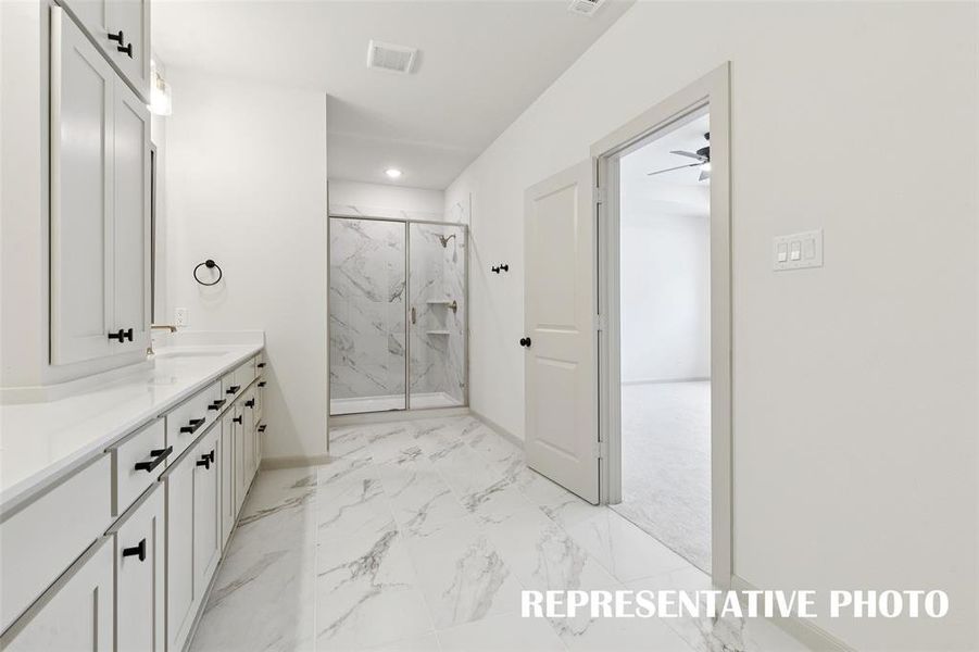 You'll find an oversized walk in shower in this lovely owner's bath.  REPRESENTATIVE PHOTO