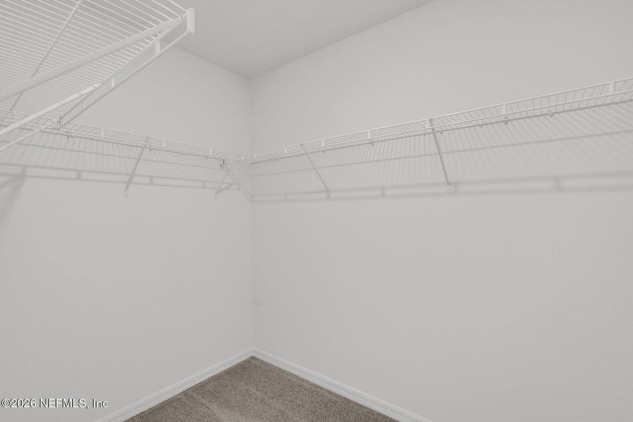 Spacious, unfurnished interior of a new home in Rolling Hills, Green Cove Springs (Image 22).