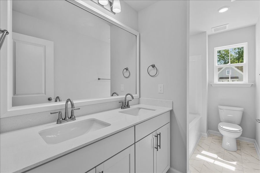 Furnished interior view inside a new home in Fieldstone, Lexington (Image 16).