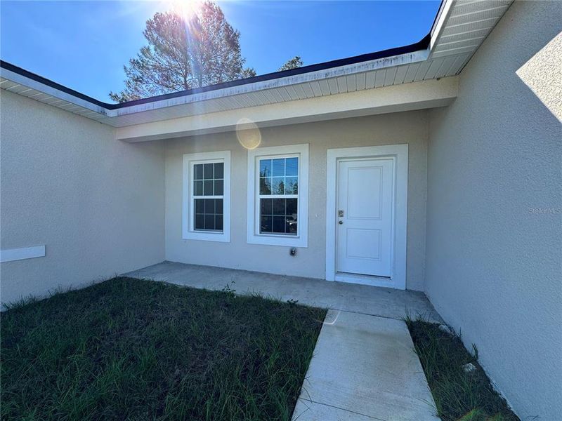 Exterior details and patio area of a home in , Citrus Springs (Image 18).