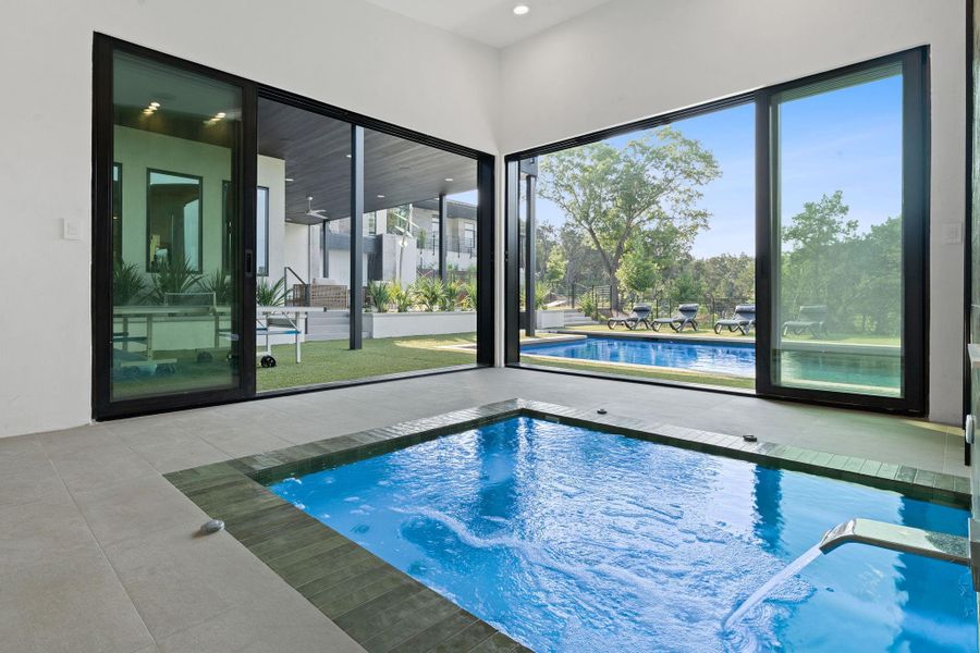 Two walls of windows in the detached spa house open the space onto the pool & patio area. Check out the virtual tour for more photos of the spa & dual sided-shower.