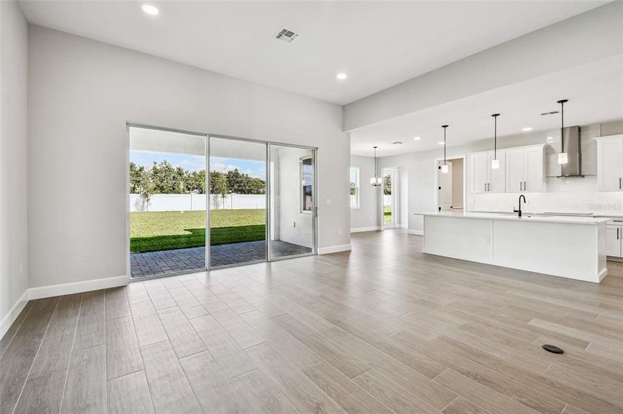 Spacious, unfurnished interior of a new home in Solace at Corner Lake, Orlando (Image 60).