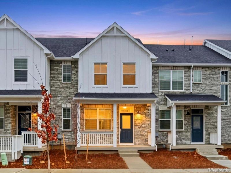 Front exterior of a new home in , Aurora, CO, highlighting curb appeal (Image 1). Front exterior of a new home in , Aurora, CO, highlighting curb appeal (Image 1).