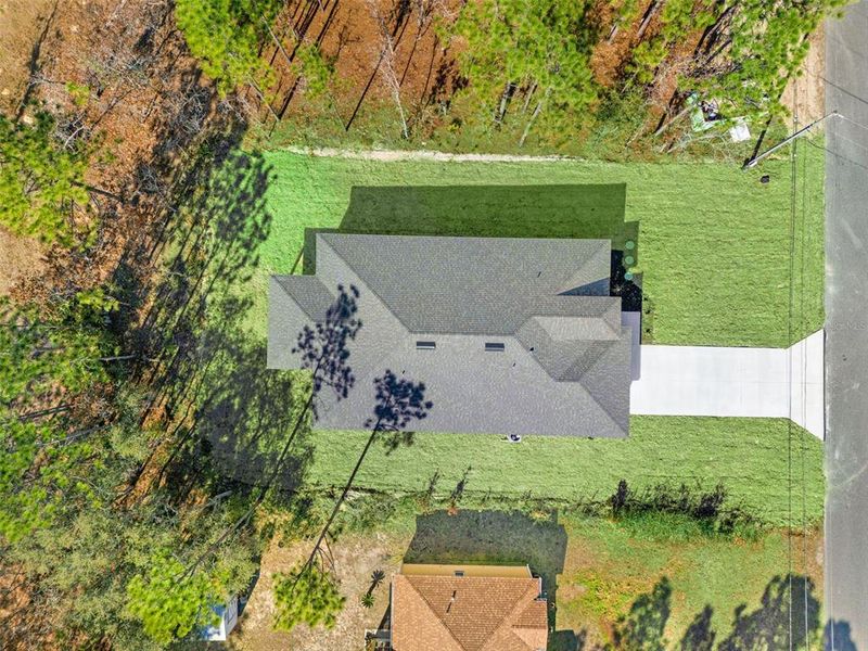 Exterior details and patio area of a home in , Citrus Springs (Image 28).