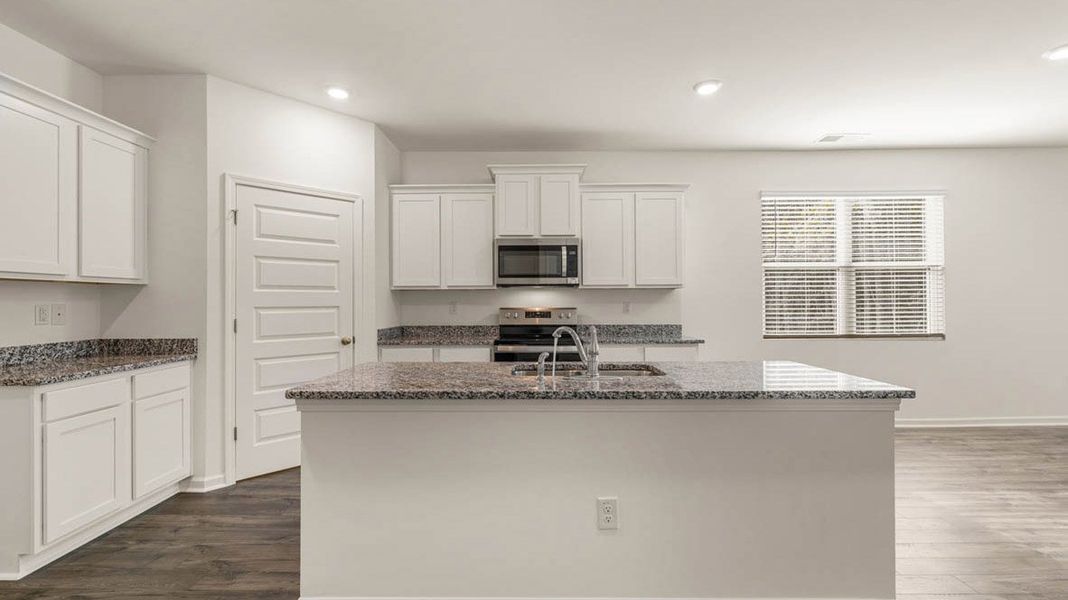 Representative furnished interior of a home built from the Dennis by D.R. Horton in Glenmaye, Hampton (Image 7).