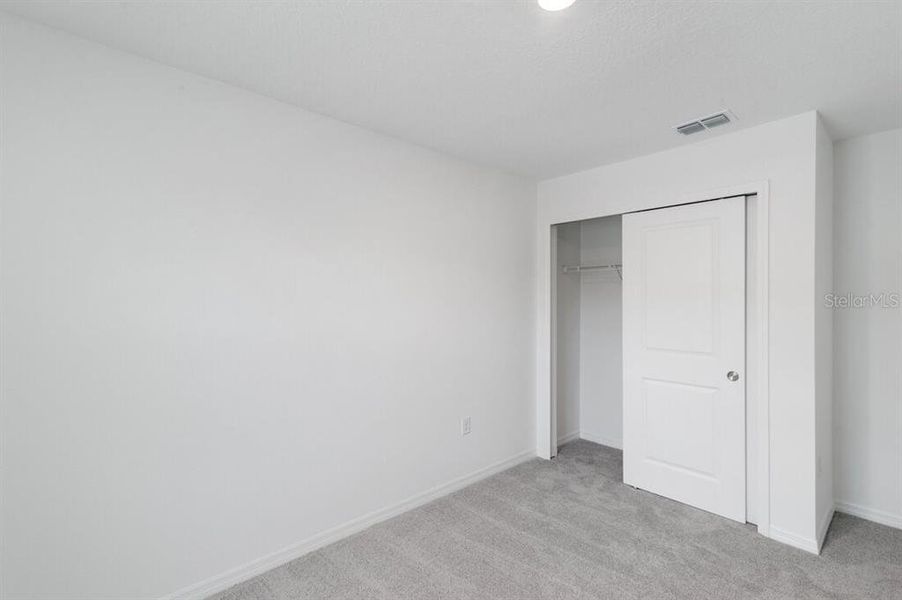 Spacious, unfurnished interior of a new home in Waterstone Townhomes, Groveland (Image 19).