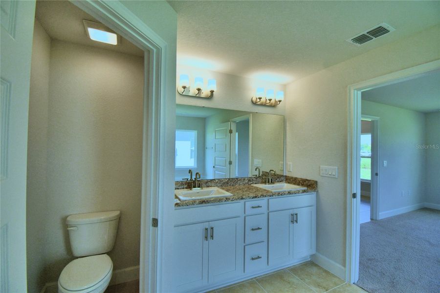 Furnished interior view inside a new home in Cadence Crossing, Auburndale (Image 15).