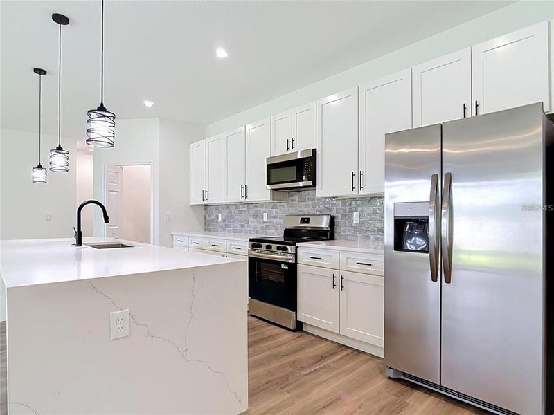 Furnished interior view inside a new home in , North Port (Image 11).