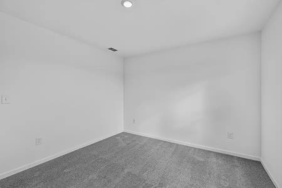 Spacious, unfurnished interior of a new home in Weatherfield, Buford (Image 29).