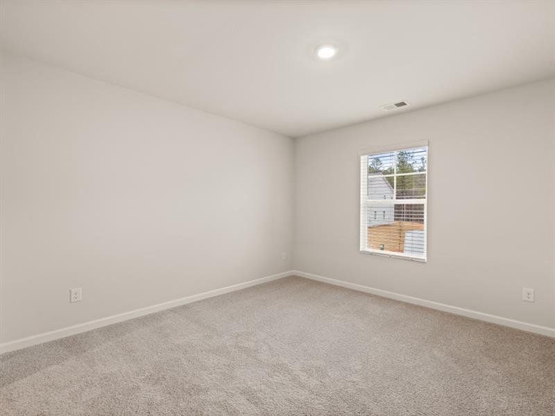 Spacious, unfurnished interior of a new home in Northwoods at Mirror Lake, Villa Rica (Image 40).