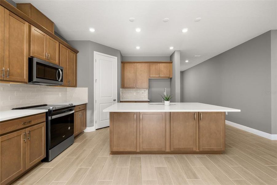 Furnished interior view inside a new home in Green Key Village, Lady Lake (Image 6).