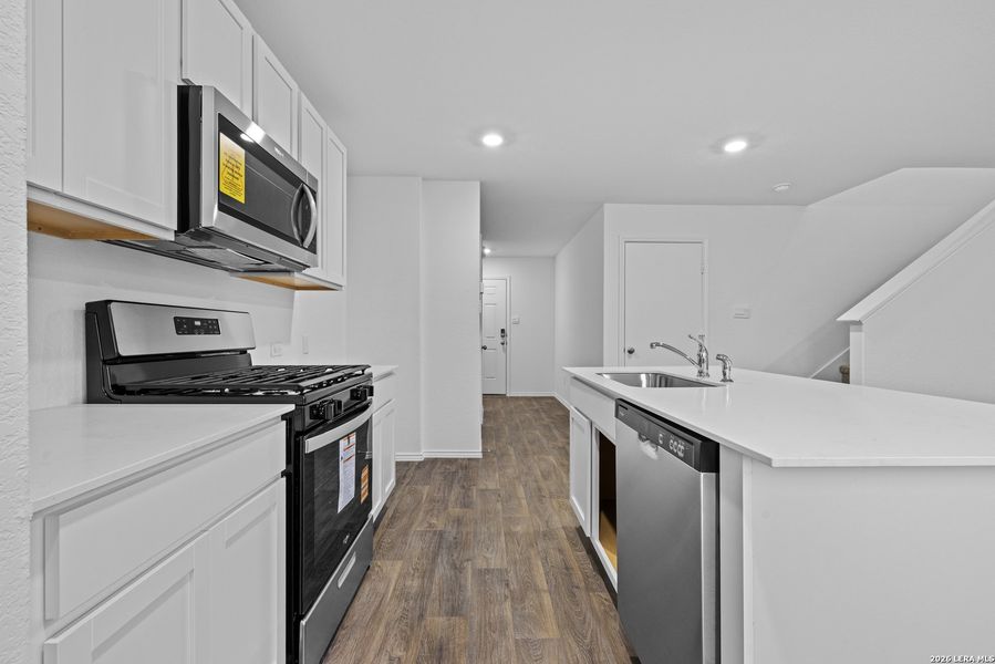 Furnished interior view inside a new home in Avenida, Converse (Image 6).