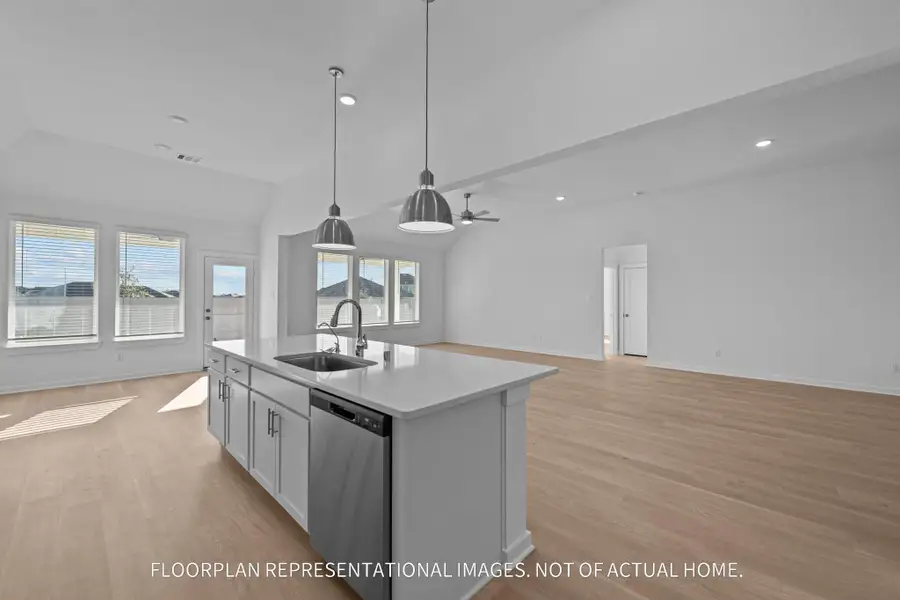 Furnished interior view inside a new home in The Oaks on 6th Street, Magnolia (Image 6).