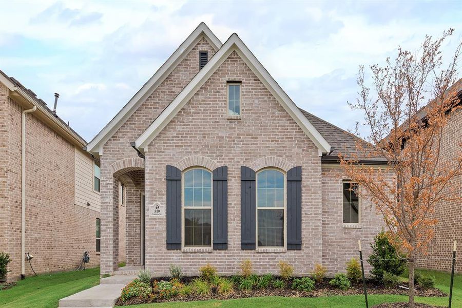 Front exterior of a new home in Edgewater, Royse City, TX, highlighting curb appeal (Image 24). Front exterior of a new home in Edgewater, Royse City, TX, highlighting curb appeal (Image 24).
