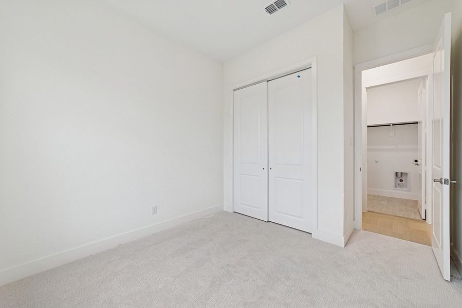 Representative unfurnished interior of a home built from the Riseley by Landon Homes in Fields - East Village, Frisco (Image 18). Representative unfurnished interior of a home built from the Riseley by Landon Homes in Fields - East Village, Frisco (Image 18).