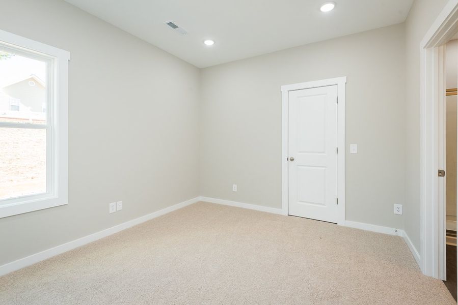 Representative unfurnished interior of a home built from the TH 1442 INT by Foundation Home Builders LLC in Stokesburg Road Townhomes, Walnut Cove (Image 13).