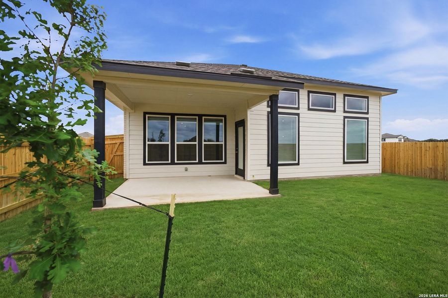 Exterior details and patio area of a home in Megan's Landing, Castroville (Image 4).