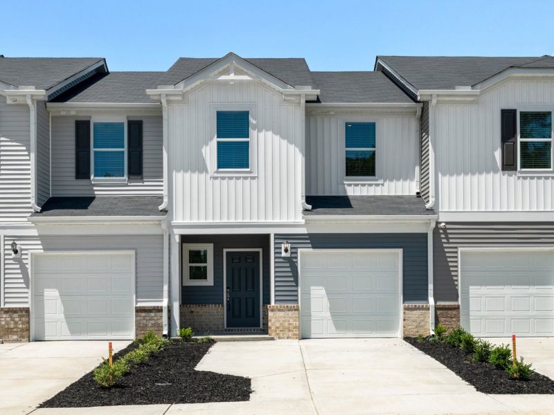 Front exterior of a new home in Valentine Townes, Greer, SC, highlighting curb appeal (Image 14). Front exterior of a new home in Valentine Townes, Greer, SC, highlighting curb appeal (Image 14).