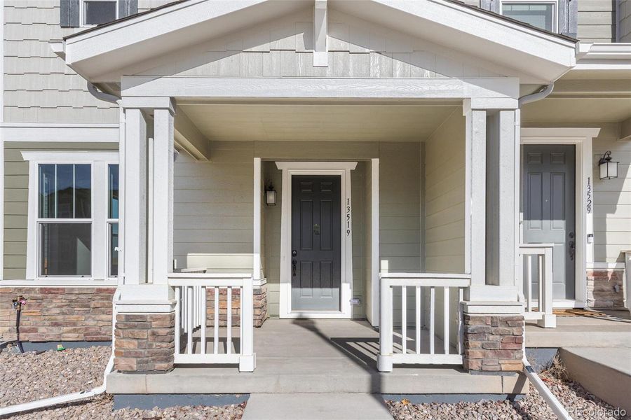 Exterior details and patio area of a home in Turnberry, Commerce City (Image 3).