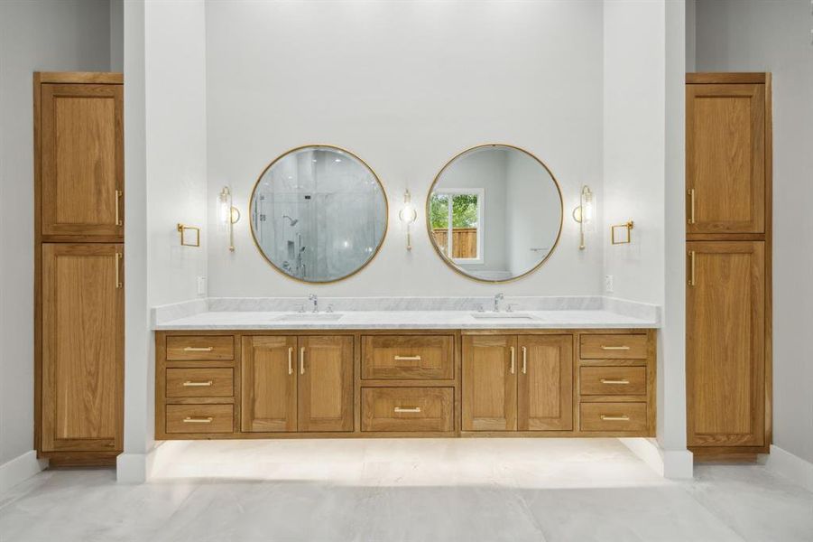 Floating White Oak Vanities; Undermount Lighting; Double Cabinets