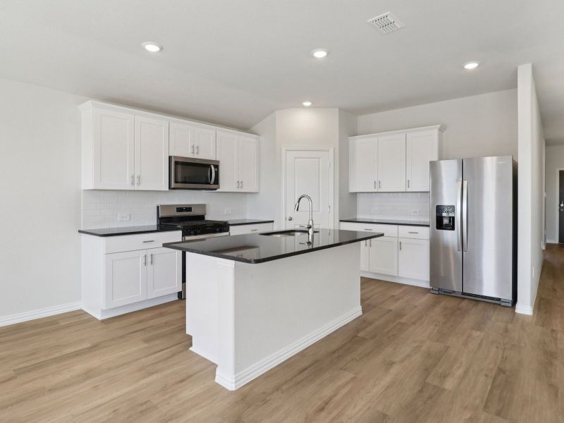 Furnished interior view inside a new home in River Ridge, Crandall (Image 6).